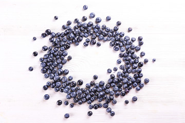 Perfectly ripe freshly picked local produce blueberries. Close up, copy space for text, top view, background. Healthy vegan snacks full of antioxidants. Seasonal summer berries.