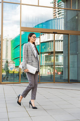 Attractive young asian businesswoman wearing suit