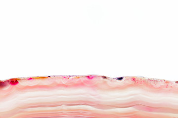 Abstract background, pink agate mineral cross section on white background