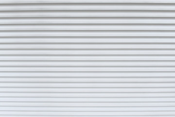 White garage door stripped texture metal background.