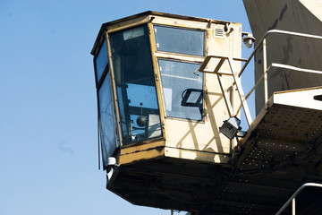 Yellow cab for crane operator. Driver's cab