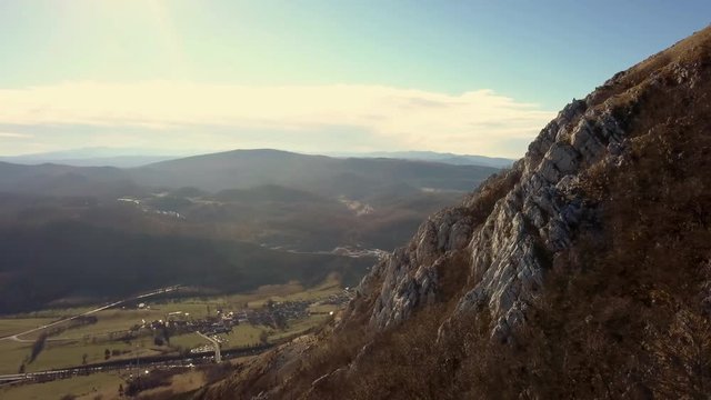 Aerial: Flying arround highest hill in Karst region of Slovenia called Nanos. Filming beautiful country at Slovenian seaside region with drone.