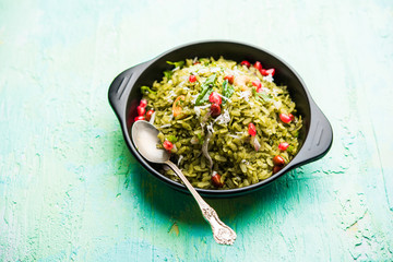 Hariyali Poha / Green Masala Pohe or flattened rice served in a bowl, selective focus