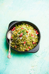 Hariyali Poha / Green Masala Pohe or flattened rice served in a bowl, selective focus