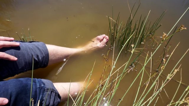 natural leech therapy, people doing leech therapy in the lake,