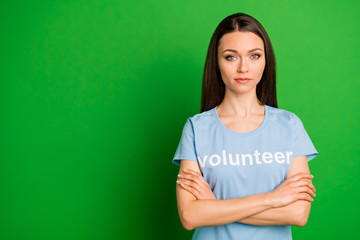 Portrait of her she nice attractive lovely calm content peaceful straight-haired girl wearing printed cotton tshirt folded arms isolated over bright vivid shine green lime background