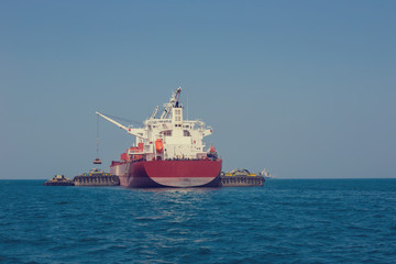 International cargo ship in the ocean, Freight transportation, Shipping, Nautical Vessel.