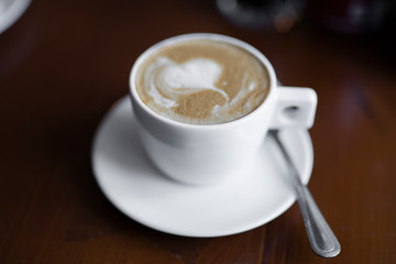 cup of coffee close up on dark background