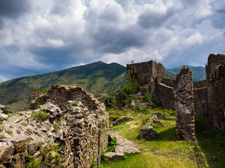 Ruins of medieval fortress Maglic on top of hill by the Ibar river in Serbia. Aerial view. Valley of this river is also called Lilac valley.