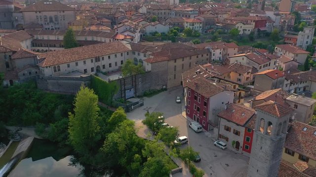 UDINE PROVINCE, ITALY - JUNE, 2019: Aerial panorama drone view of small town Cividale del Friuli beautiful architecture