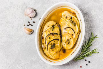 Lemon garlic chicken breasts. Top view, space for text.