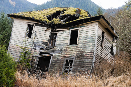Collapsing wooden plank house, haunted house