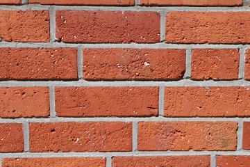 Obraz premium Background with texture of a red brick wall, copy space