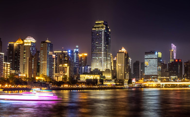 Along the Zhujiang River and modern building of financial district at night in guangzhou china.