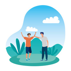 happy young men friends celebrating in the park