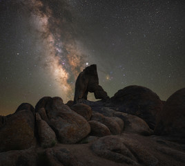 Beautiful clear sky at night over Boot Arch in Alabama Hills, California 