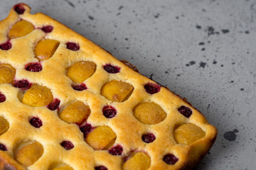 Close-up of apricot pie on table top view