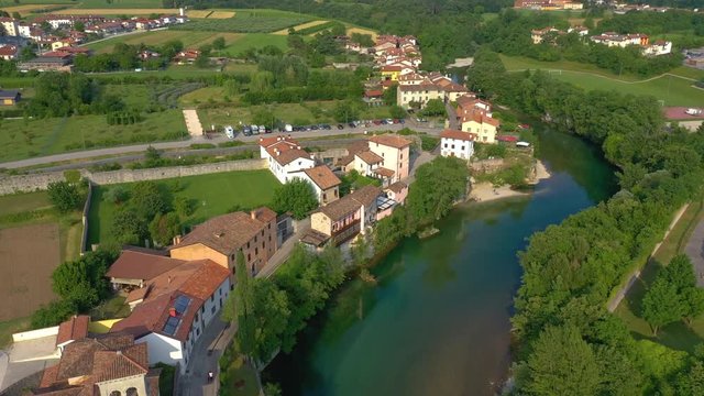 UDINE PROVINCE, ITALY - JUNE, 2019: Aerial panorama drone view of small town Cividale del Friuli beautiful architecture