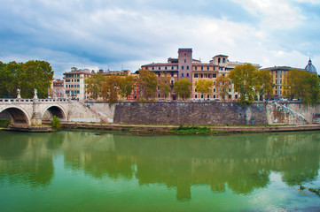 Several ancient stone buildings and ponte Sant'Angelo bridge