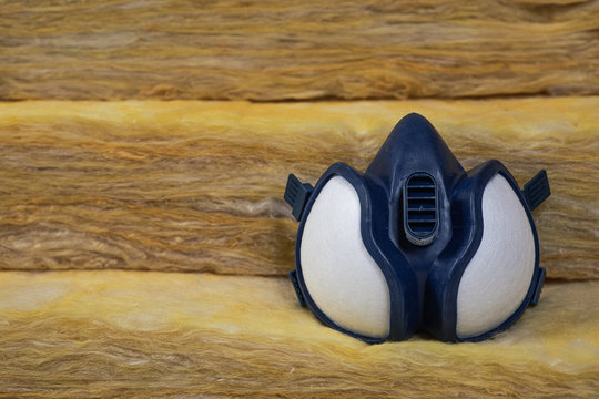 Gas mask sitting on some mineral wool rockwool (stonewool) panels