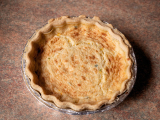 Quiche lorraine close up. French style pastry food.
