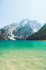 view of braies lake in alps mountains