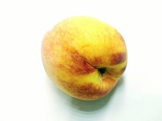 A picture of peach isolated on white background