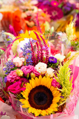 Bunches of cut flowers at an outdoor market
