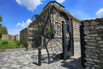 Corvin Gate on St. George Square of Royal Palace of Budapest,with big black raven on top, symbolizing of King Matthias Corvinus, Hungary