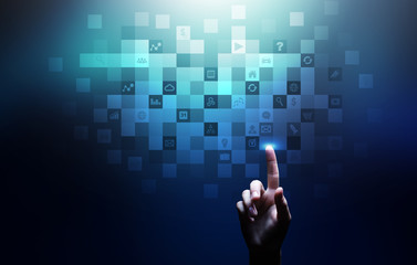 Application icons on virtual screen. Technology and business concept.