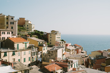 Riomaggiore town in Cinque Terre, Italy in the summer
