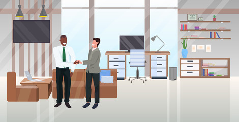 mix race businessmen handshaking partnership agreement concept businesspeople standing together successful deal moden office interior flat horizontal full length
