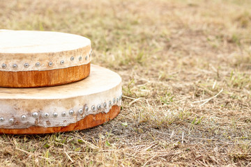 Shamanic tambourine. Shamanic drum. shaman tambourine lies on the grass