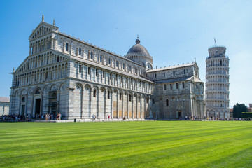 Fototapeta premium View of the Leaning Tower and the Pisa Cathedral in sunny day, Italy
