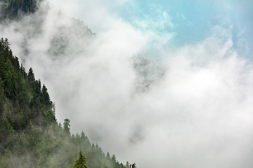 Fototapeta na wymiar Clouds on mountains