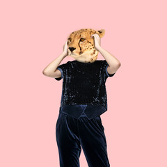 Leopard with the slim female body in velvet clothes. Feminine, wild nature. Negative space to...