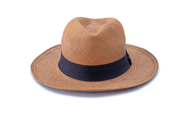 Vintage brown Straw hat fasion with black ribbon isolated on white background. This has clipping path