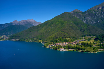 Naklejka na ściany i meble Aerial photography with drone. Panoramic view of Lake Ledro in the north of Italy In the Alps.
