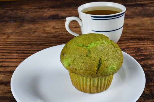 Cup Of Tea And Pistachio Muffin-