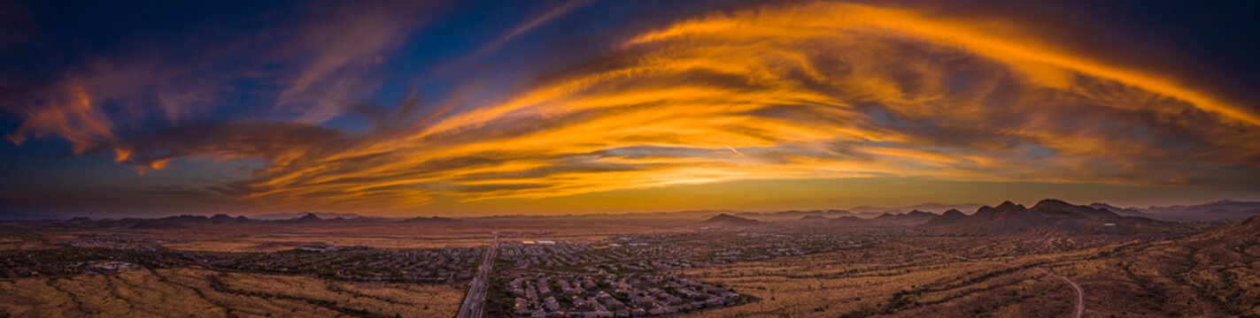 Panoramic Aerial View Of A Desert Community In Arizona During The Golden Hour At Sunset.