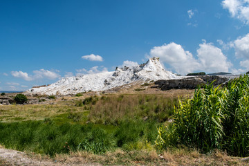 Turkey, panoramic view of travertine terraces at Pamukkale (Cotton Castle), natural site of sedimentary rock deposited by water from the hot springs, famous for carbonate mineral left by flowing water