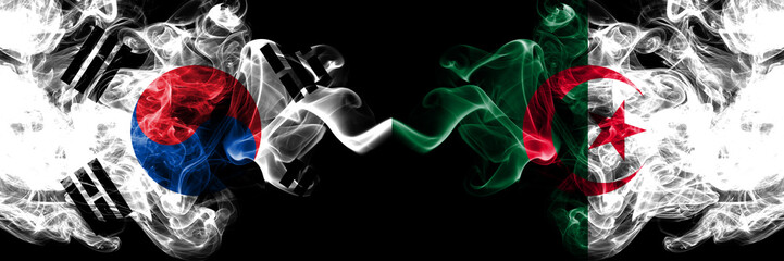 South Korea vs Algeria, Algerian smoky mystic flags placed side by side. Thick colored silky abstract smoke flags of South Korean and Algeria, Algerian