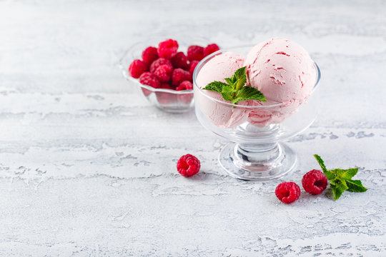 Raspberry ice cream in bowl