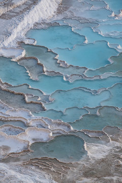 Turkey, calcium pools on travertine terraces at Pamukkale (Cotton Castle), natural site of sedimentary rock deposited by hot springs, famous for carbonate mineral left by flowing water