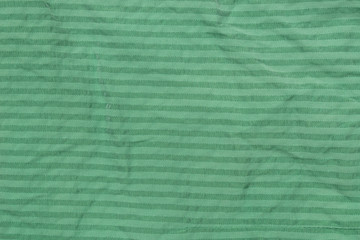creased green textile background texture