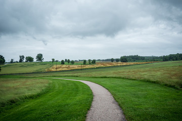 Fototapeta na wymiar Path through the farm field