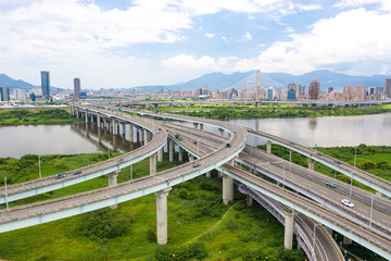 Fototapeta premium Traffic Aerial View - Traffic concept image, birds eye daytime view use the drone in Taipei, Taiwan.