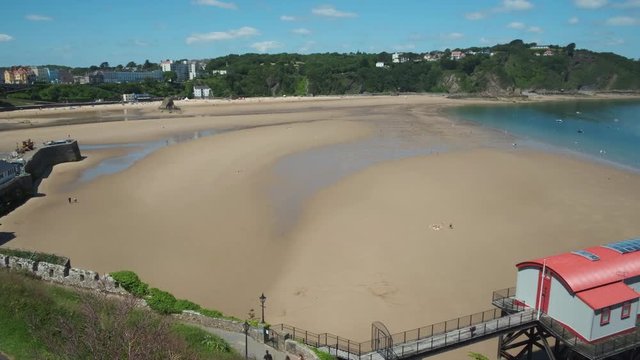 Looking out from Castle Hill towards North Beach and the Old Life Boat station Tenby Pembrokeshire Wales 