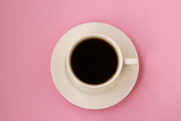 Obraz na płótnie Canvas Cup of coffee on pink background, Top view, Flat Lay, Copy space, horizontal photo