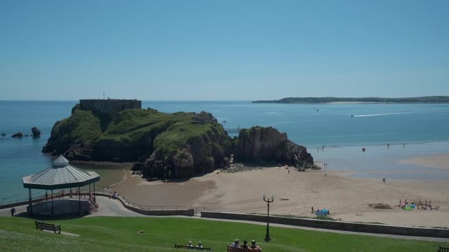 Looking out from Castle Hill towards South Beach and Cladey Island Tenby Pembrokeshire Wales 